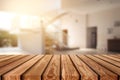 Wooden table top striped on blurred interior workplace building background