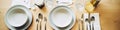 A wooden table topped with white plates and silverware, AI