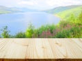 Wooden table and view of beautiful lake and mountain Royalty Free Stock Photo