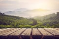 Wooden table and view of mountain with sun light Royalty Free Stock Photo