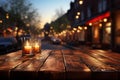 Wooden table waits amid bokeh lights, cafe charm blending with serene emptiness