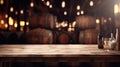 Wooden table with Wine barrels in wine-vaults in order on background