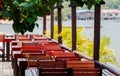 Wooden Tables and Chairs at a open Terrace Restaurant Royalty Free Stock Photo