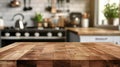Wooden tabletop against blurred kitchen background for product mockups and display montages.