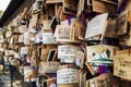 Wooden tablets with wishes written on them in Japanese temples. Tokyo, Japan, 04/04/2017 Royalty Free Stock Photo