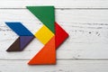 Wooden tangram in swallow shape