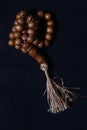 Wooden Tasbih, Love Shape Islam People prayer bead at Black Background