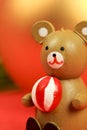 Wooden teddy bear with Christmas decoration