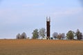 Wooden Telecommunication tower with transmitters. Cellular base station with transmitter antennas on a telecommunication tower on Royalty Free Stock Photo