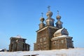 Wooden temple complex summer and winter churches. Vorzogory village, Arkhangelsk region, Russia Royalty Free Stock Photo