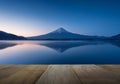 Wooden terrace and mountain fuji with reflection at lake kawaguchiko Royalty Free Stock Photo