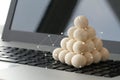 wooden texture ball stacking with social media diagram on laptop Royalty Free Stock Photo