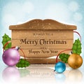 Wooden texture frame for Christmas with colorful balls, holly leaf and snowfall Royalty Free Stock Photo