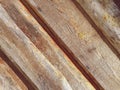 Wooden texture. sticks and logs, natural material for building a house. wooden long sticks with round patches of resin. natural