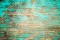 Wooden texture, turquoise cracked paint