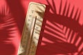 Wooden thermometer showing 40 degrees Celsius or 104 degrees Fahrenheit during summer heat wave