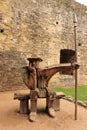 Wooden Thinking man inside conwy castle grounds