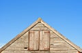 Wooden timbered barn and clear blue sky. Thornham, Norfolk