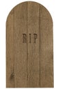 Wooden tombstone with word RIP carved in the middle