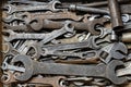 Wooden tool box of hand tools with old and dirty, rusty wrenches, ring spanners and other do-it-yourself for diy, closeup, top Royalty Free Stock Photo