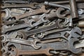 Wooden tool box of hand tools with old and dirty, rusty wrenches, ring spanners and other do-it-yourself for diy, closeup, top Royalty Free Stock Photo