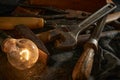 Wooden tool box of used hand tools with old and dirty, rusty wrenches, hammers and old light bulb Royalty Free Stock Photo