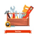 Wooden toolbox full of equipment