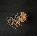 Wooden Toothpicks on Black Background with Copy Space, Flat Lay Tooth Picks, Wood Toothpicks Top View Mockup Royalty Free Stock Photo