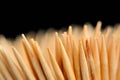 Wooden Toothpicks Close-Up on Black Background