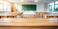 Wooden top with blurred empty classroom background Royalty Free Stock Photo