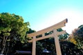 Wooden torii gate of Meiji Jingu Shrine in Harajuku Central Tokyo, Japan. Royalty Free Stock Photo