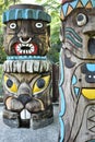 Wooden totem poles carving art sculpture Royalty Free Stock Photo