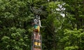 Wooden totem poles in Stanley Park. First Nations culture, travel, national art Vancouver, British Columbia, Canada Royalty Free Stock Photo