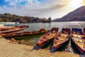 Beautiful mountain lake Bhimtal with view of tourist boats at sunset at Nainital, Uttarakhand India