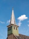 Wooden tower with constricted spire of Haghakerk, church in Heeg, Friesland, Netherlands