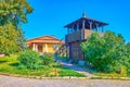 The wooden tower of former fortress and the restaurant on background, Poltava, Ukraine