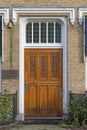 Wooden townhouse entrance front door Royalty Free Stock Photo