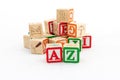 Wooden toy alphabet learning blocks. A and Z alphabets are focused with blurred alphabets background Royalty Free Stock Photo
