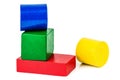 Wooden toy blocks shapes on white Royalty Free Stock Photo