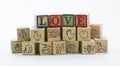 Wooden toy blocks spelling I love you isolated on a white background Royalty Free Stock Photo