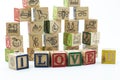 Wooden toy blocks spelling I love you isolated on a white background Royalty Free Stock Photo