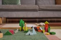 Wooden toy bricks build with trees and cute animals, creative play concept Royalty Free Stock Photo