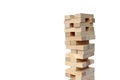 Wooden toy for building a tower with small blocks. Royalty Free Stock Photo