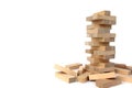 Wooden toy for building a tower with small blocks. Royalty Free Stock Photo