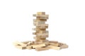 Wooden toy for building a tower with small blocks. Royalty Free Stock Photo