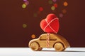 Wooden toy car with red heart Royalty Free Stock Photo