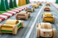 wooden toy cars lined up on a miniature race track Royalty Free Stock Photo