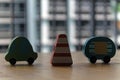 Wooden toy cars with traffic pylon on the table. Royalty Free Stock Photo