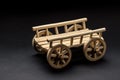Wooden Toy Cart on a dark background Royalty Free Stock Photo