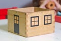 Wooden toy house. Mortgage property home concept. Buying house for family . Wooden toy house. Small toy house home Royalty Free Stock Photo